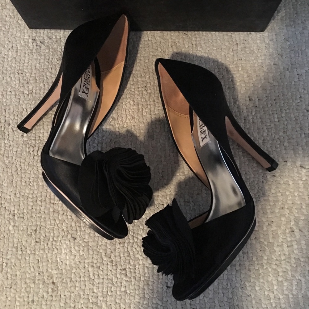 Badgley Mischka satin pump with silk flower.